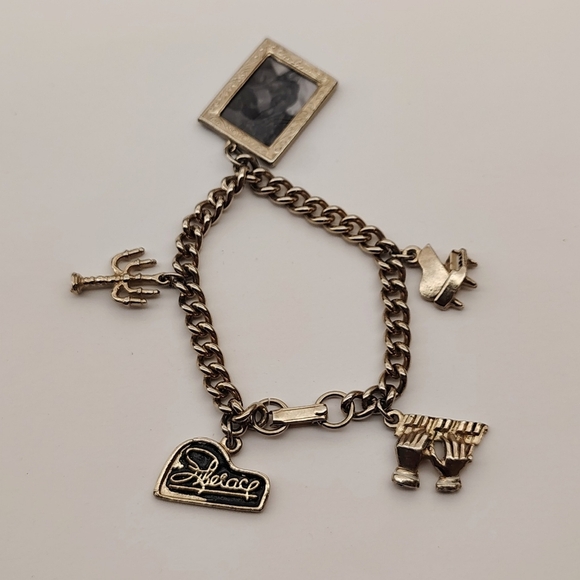 Liberace Jewelry - Liberace Vintage Silver Tone Charm Bracelet w/ Charms